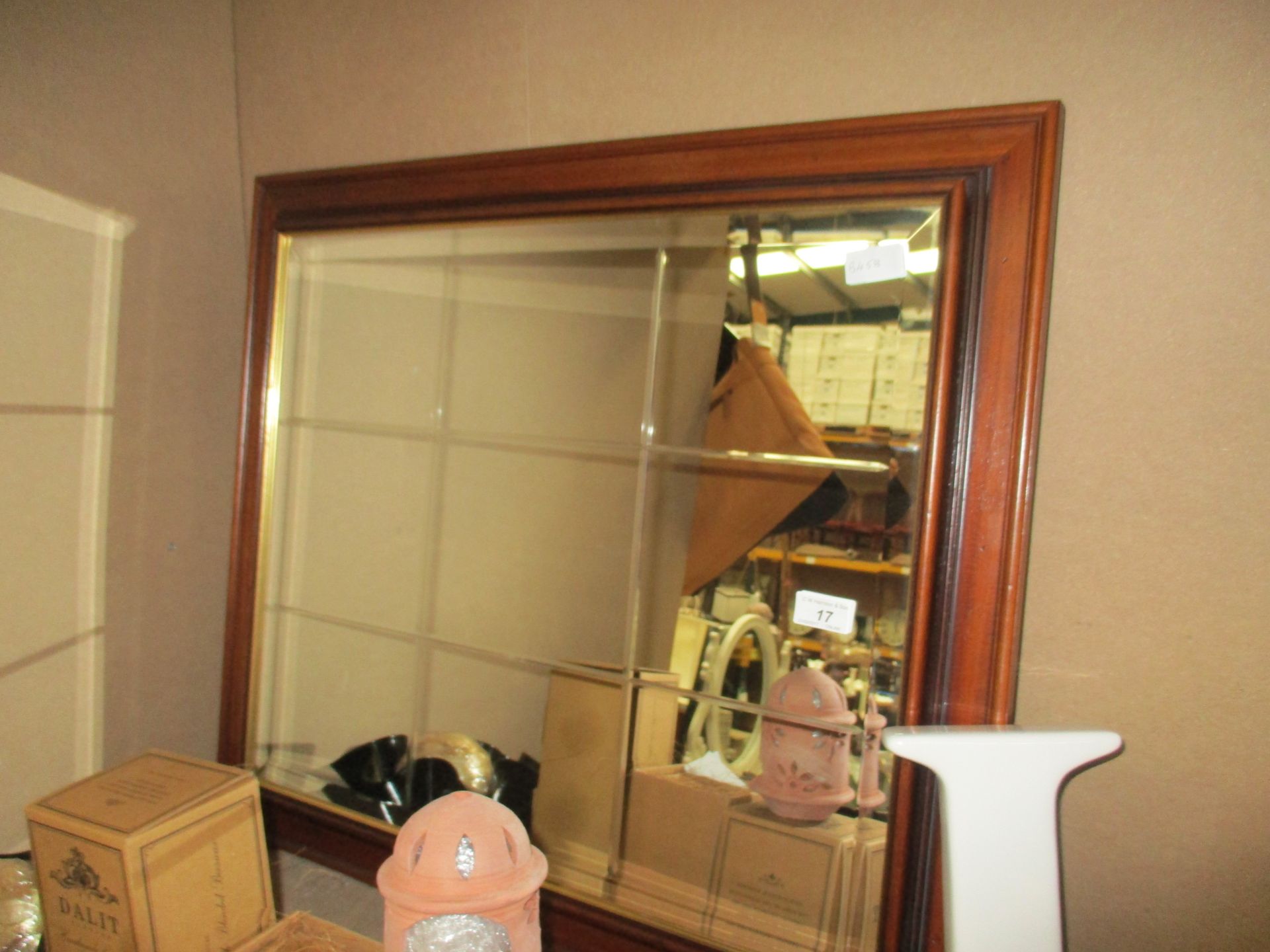 A mahogany framed bevel edged wall mirror