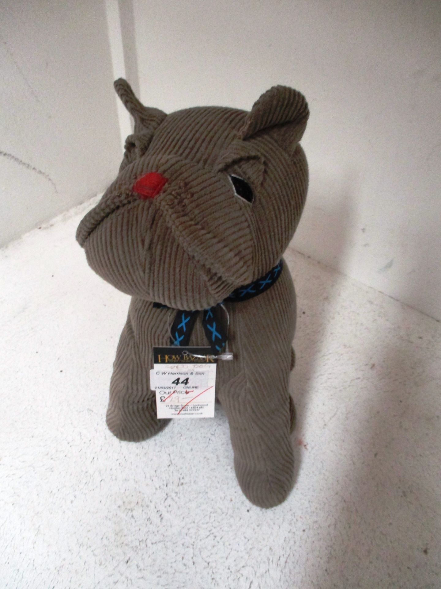 A brown cord British bulldog doorstop