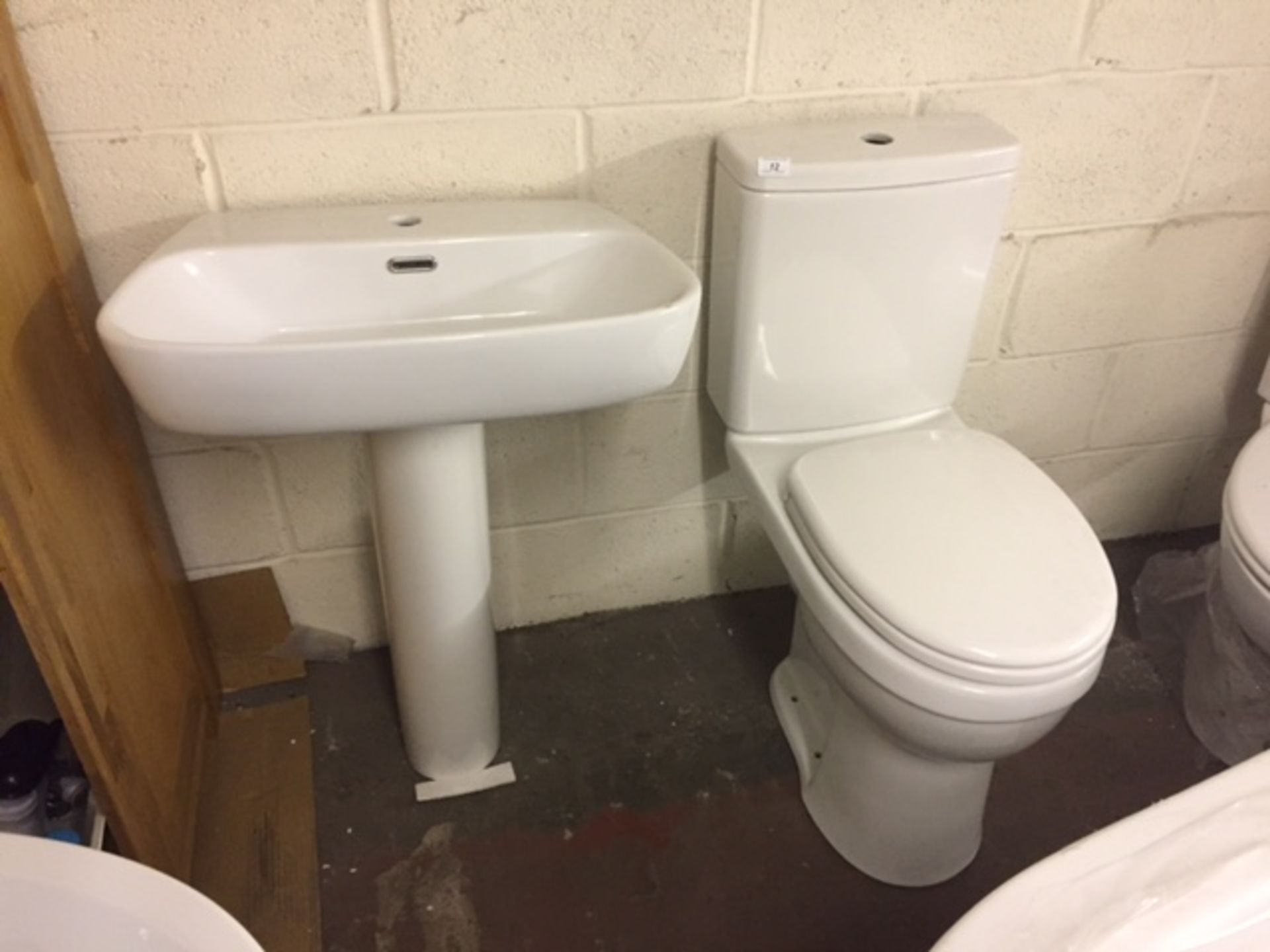 comfort height dual flush toilet with seat & basin with pedestal