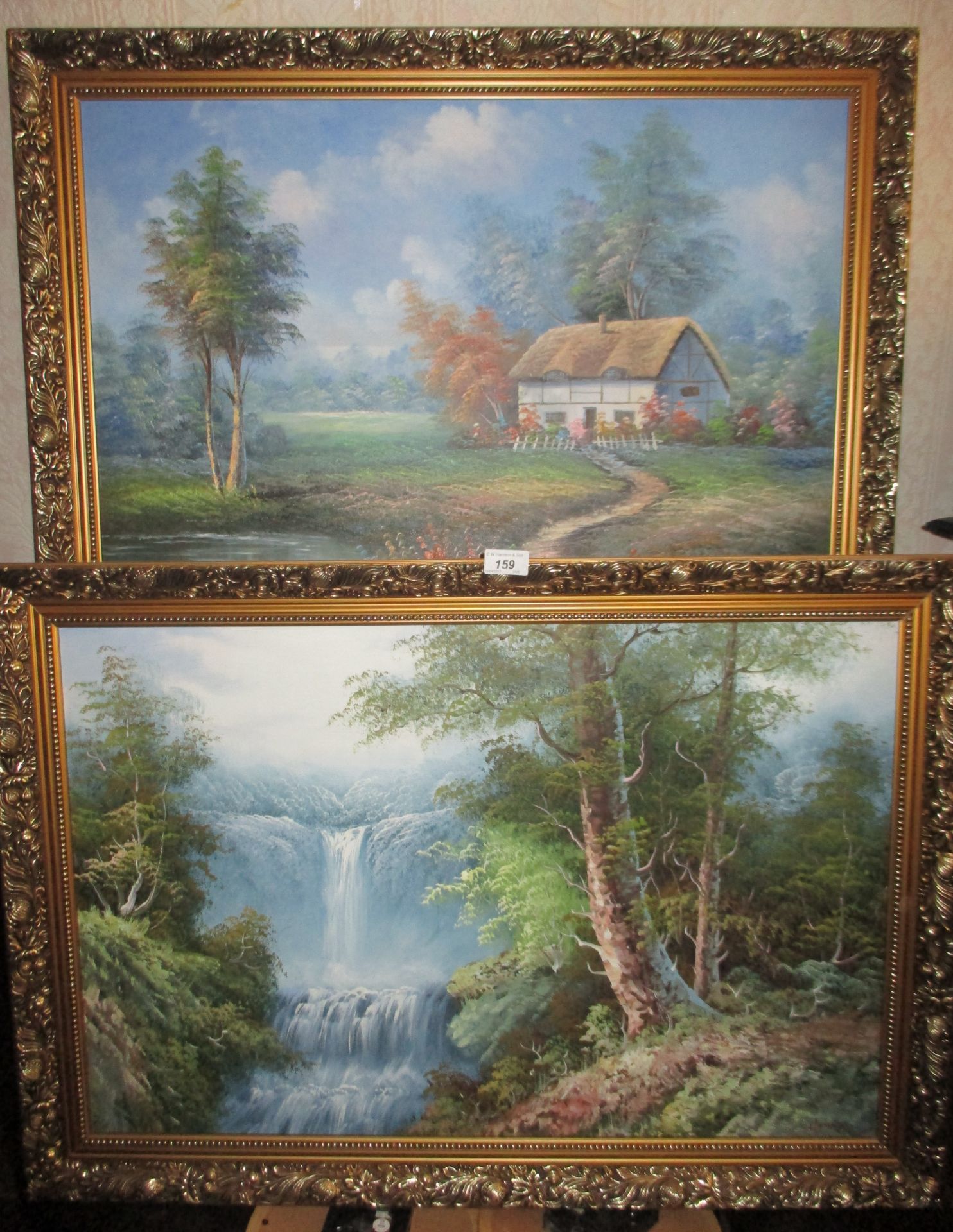 2 x gilt framed oils on board 'Waterfall' and 'Cottage' scene each 50 x 70cm