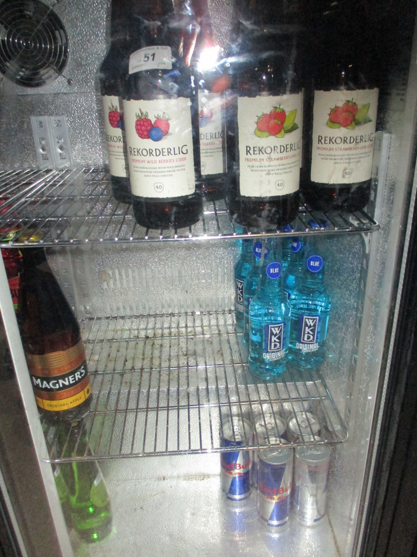 Contents to two under counter fridges - bottles of Magners and Recorderlig cider, WKD, Fruit Shoot,