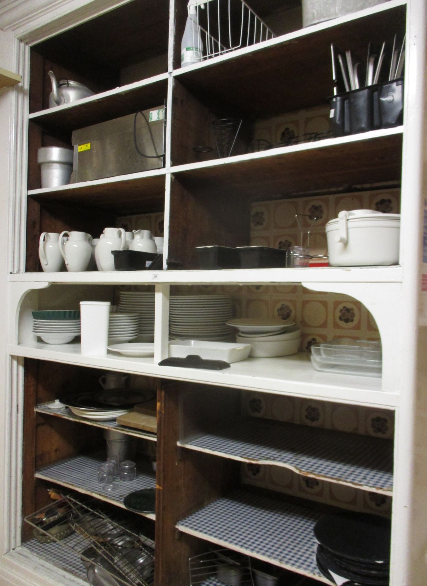 Contents to wall cupboard - milk jugs, plates, saucers, etc.