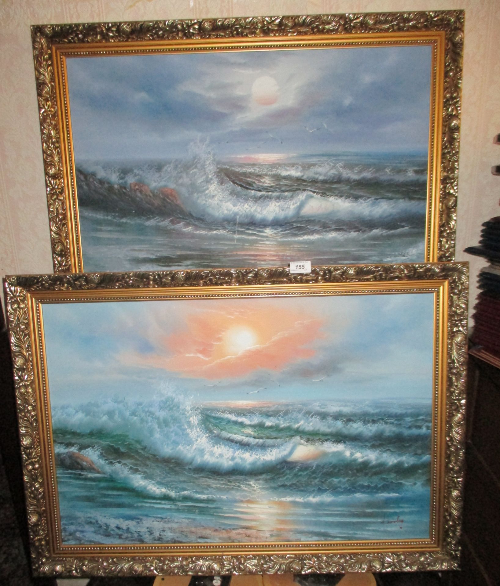 2 x gilt framed oils on board 'Waves Breaking on a seashore' each 50 x 70cm.