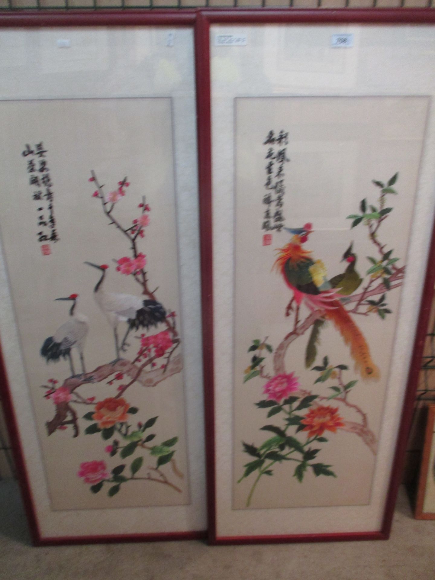 Exotic Avians - a pair of large silk embroidery pictures signed and inscribed in Chinese each 102 x