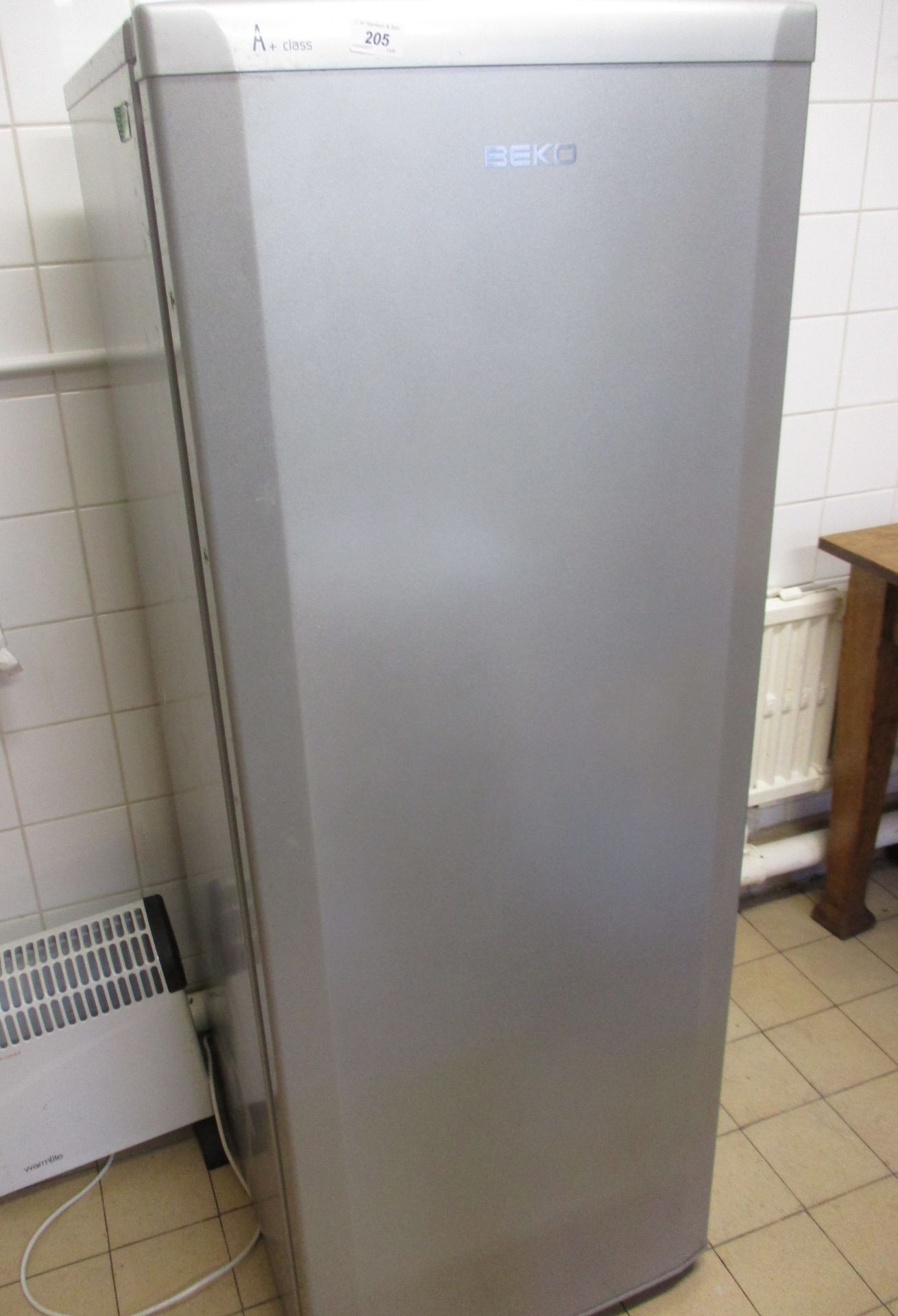 Beko A + Class upright refrigerator.