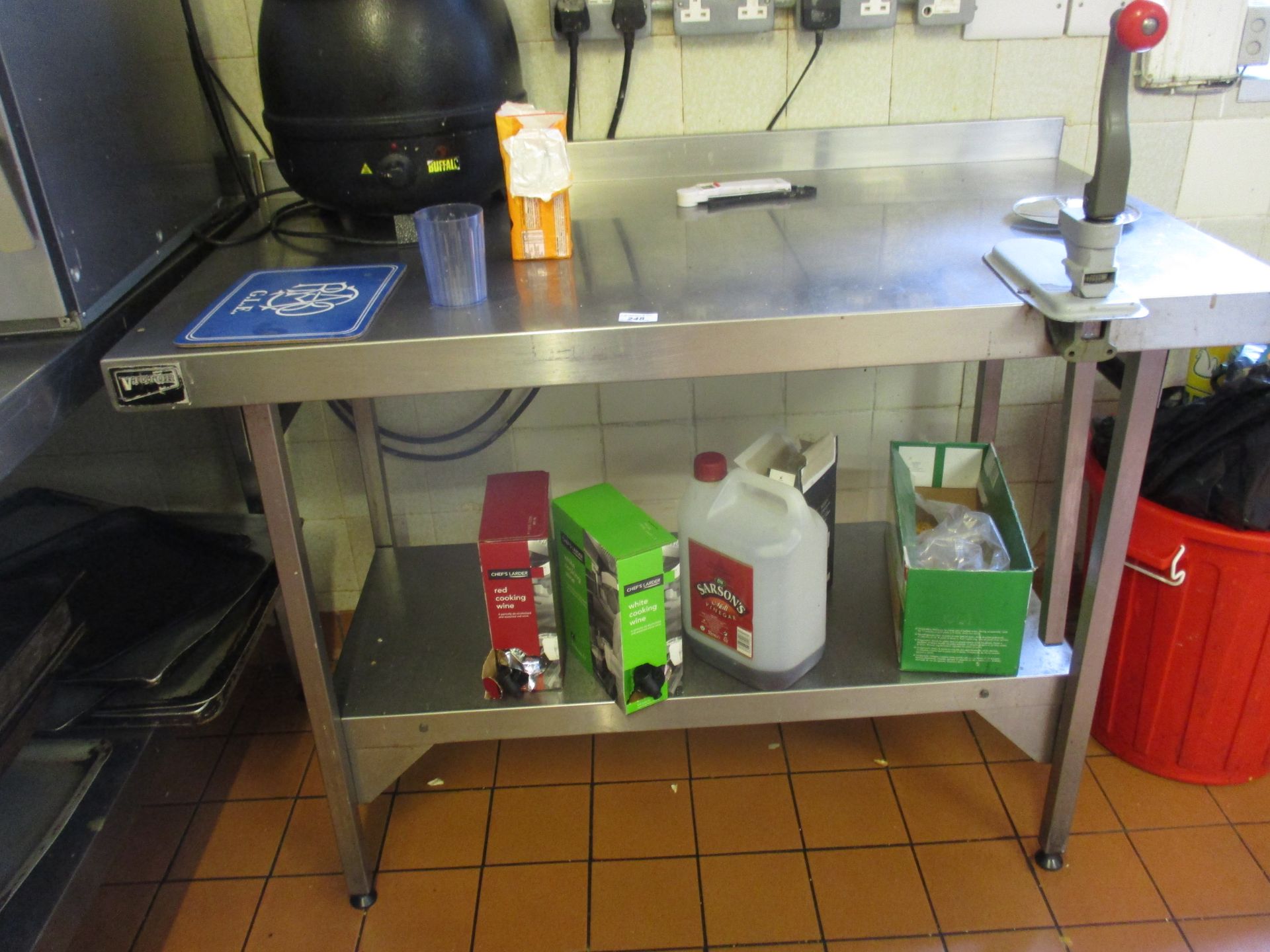 A Victor stainless steel two tier preparation table 120 x 66cm c/w manual commercial can opener.