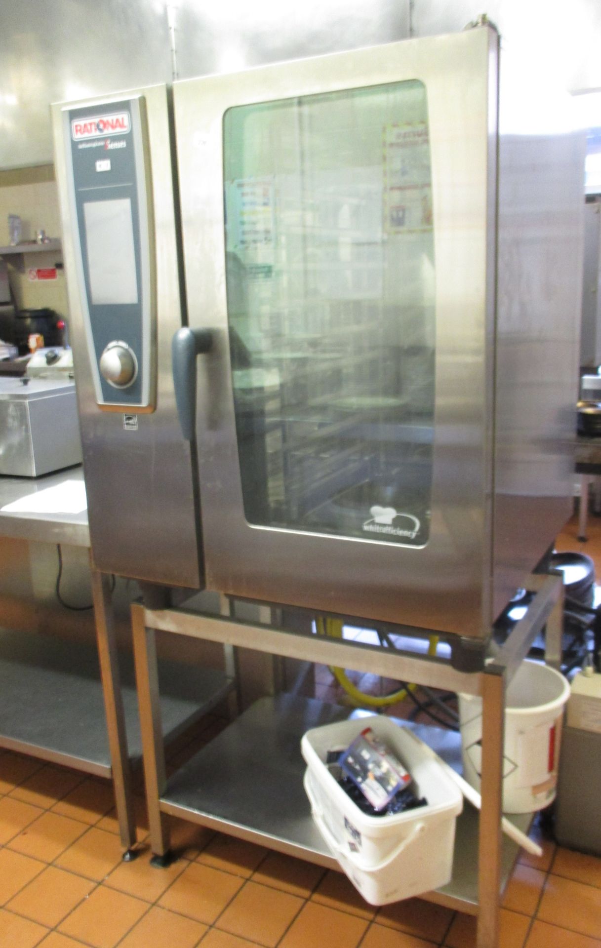 A RATIONAL SENSES SELF COOKING CENTRE in stainless steel, on stainless steel base, model no.