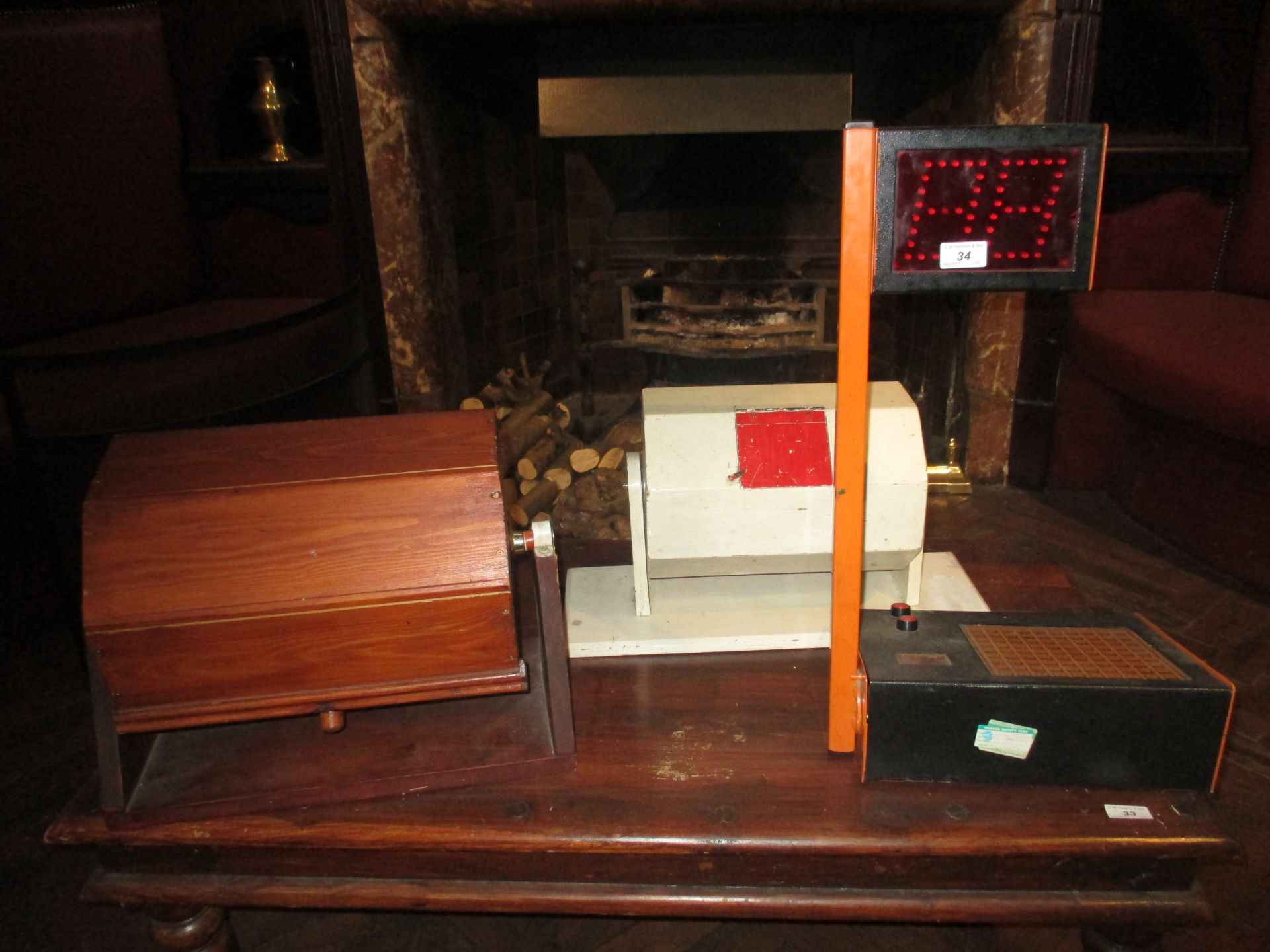 Two rotating wooden tombola tumblers and an electronic bingo machine [no leads] [3]