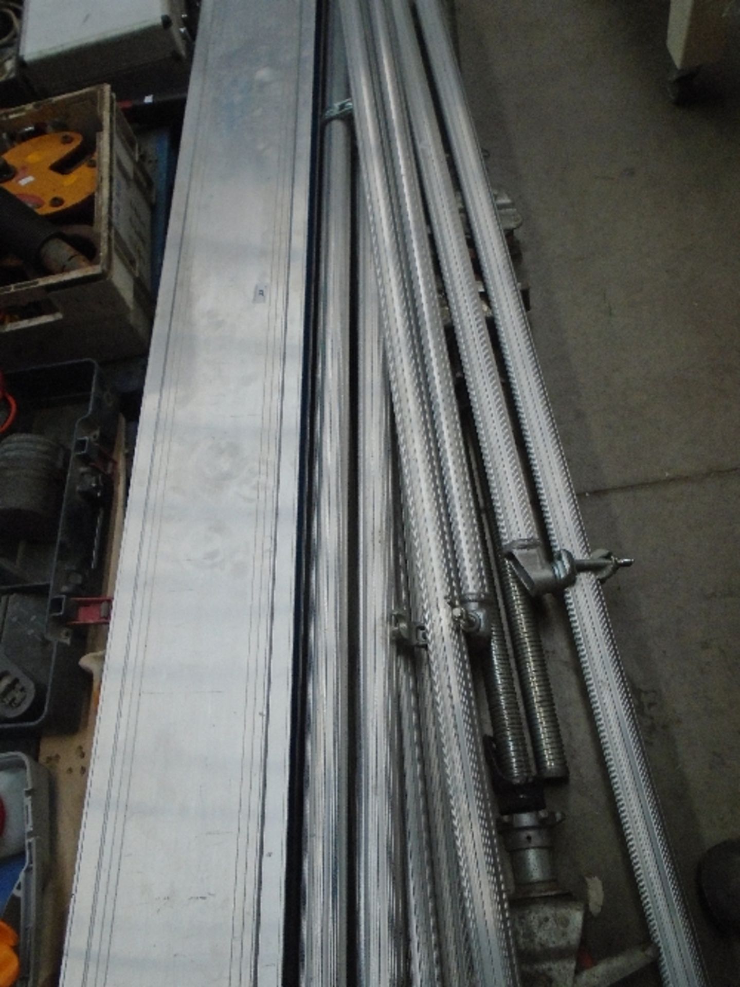 A quantity of aluminium scaffolding - 11 x beams, 3 x support legs, folding platform,