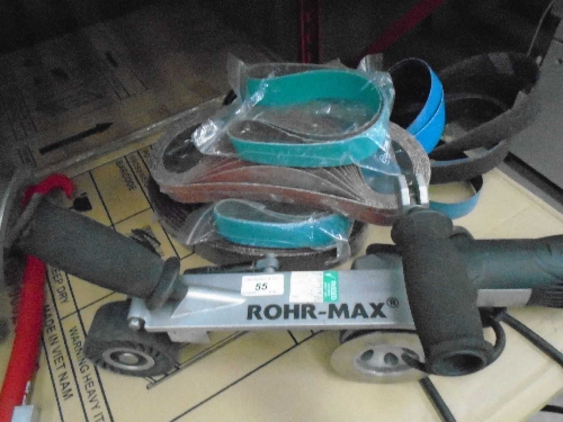 A Rohr-Max professional grind/blend and polishing machine 110v complete with a quantity of sanding