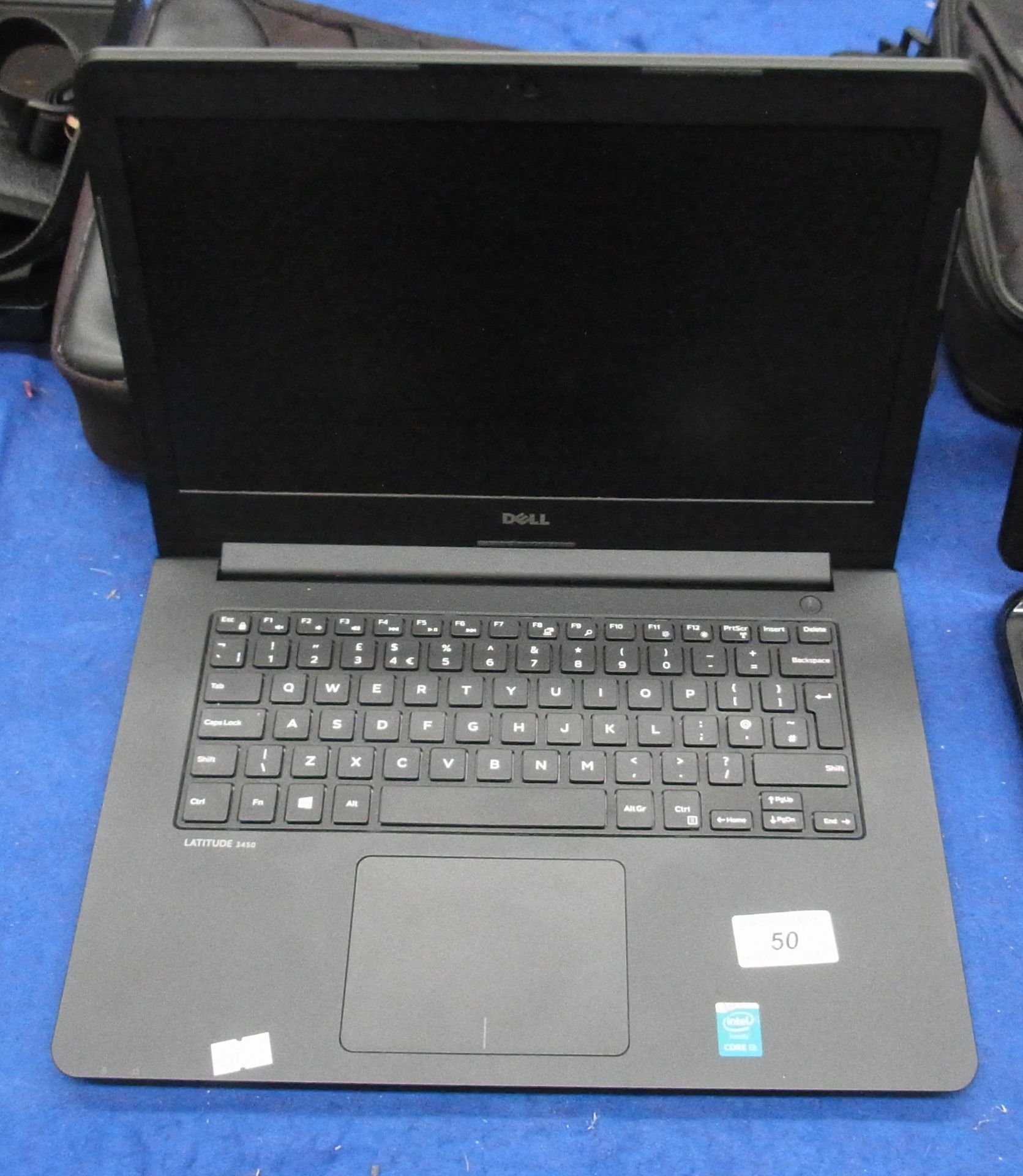 A Dell Latitude 3450 laptop computer complete with power adaptor and a bag