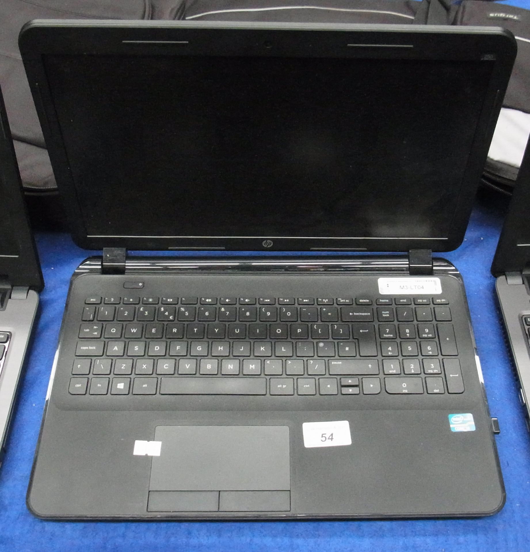 A HP 250 laptop computer complete with power adaptor and a bag