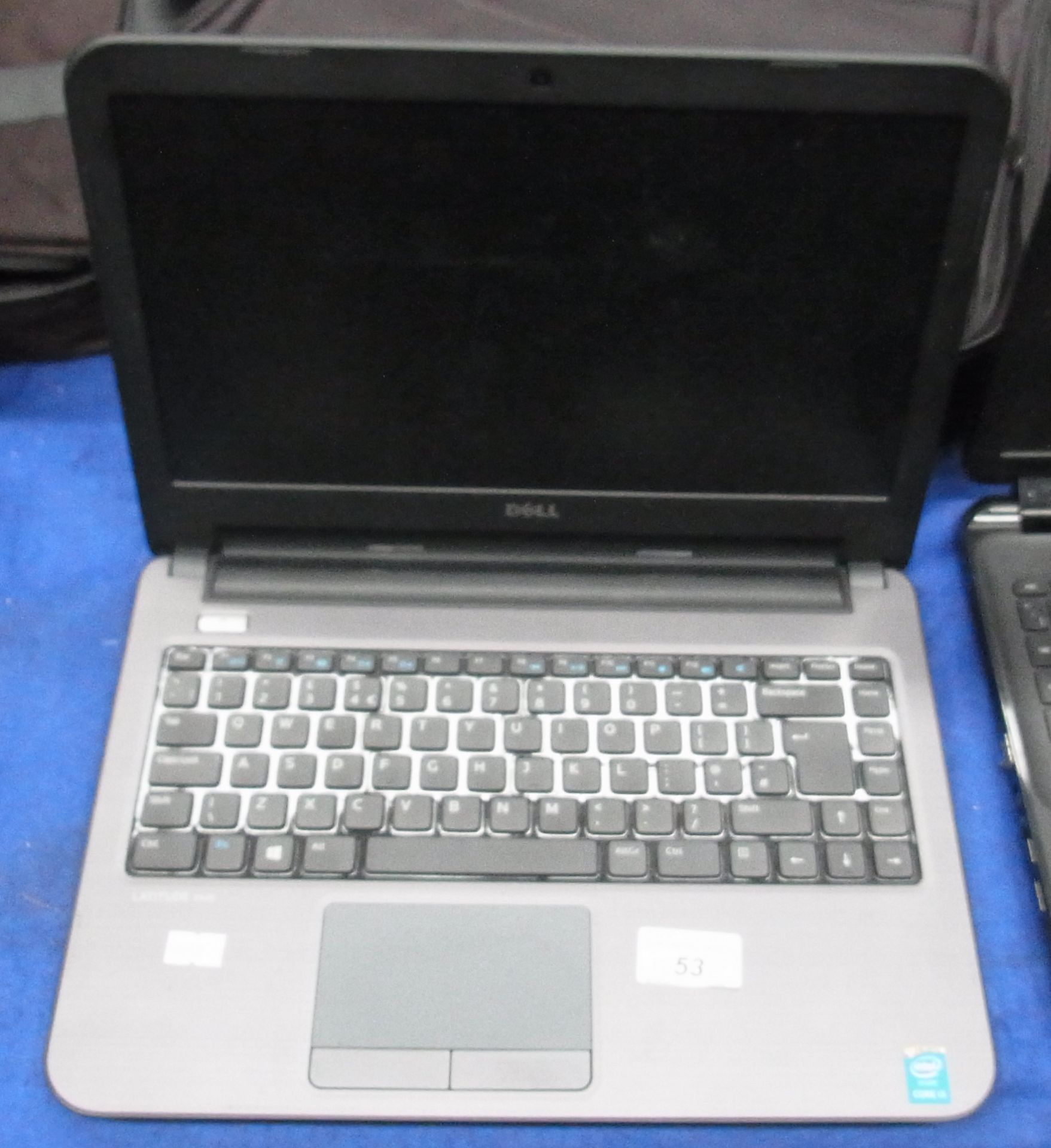 A Dell Latitude 3440 laptop computer complete with power adaptor and a bag