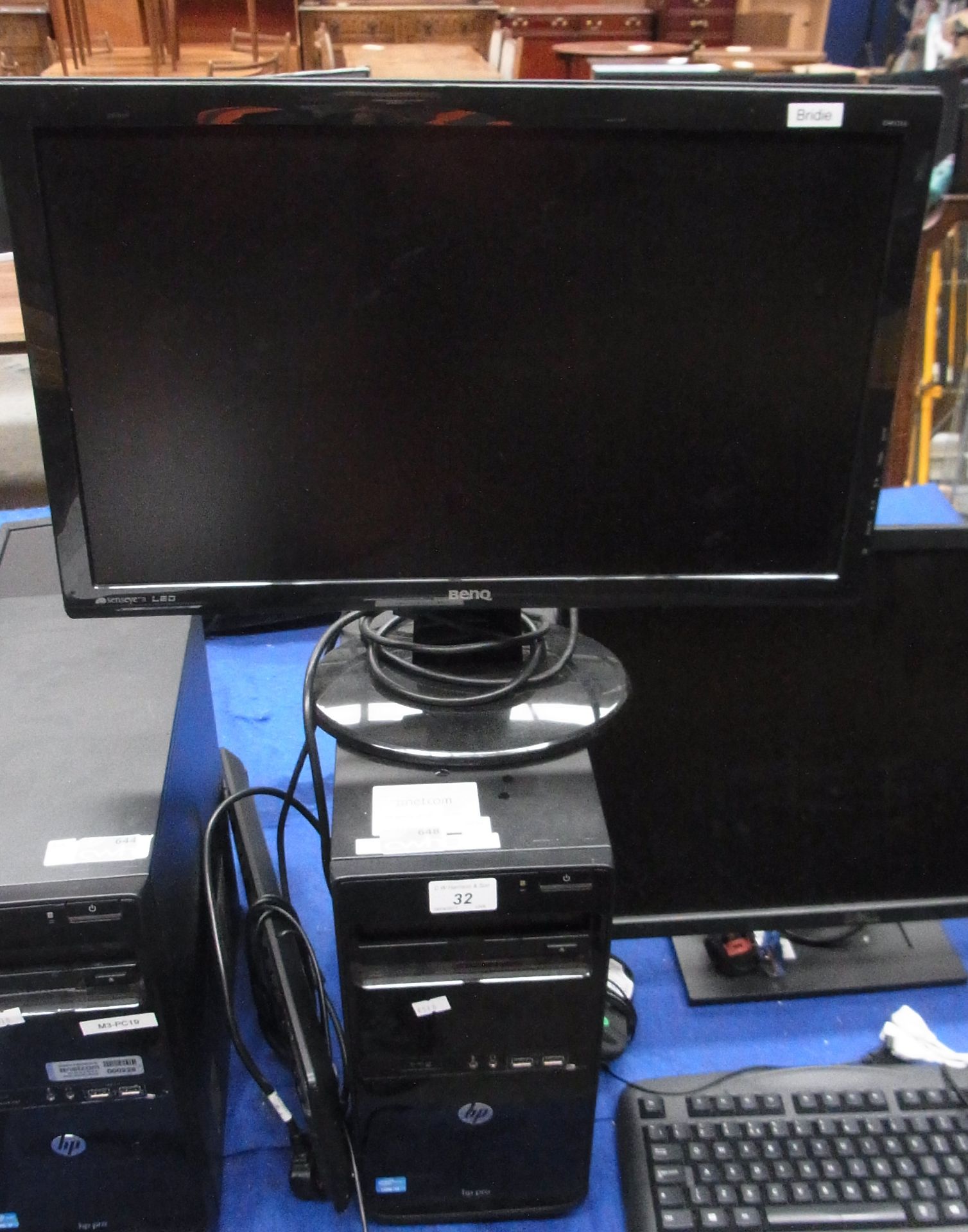 A HP Pro tower computer - power lead complete with a Benq LED 22" monitor - power lead,