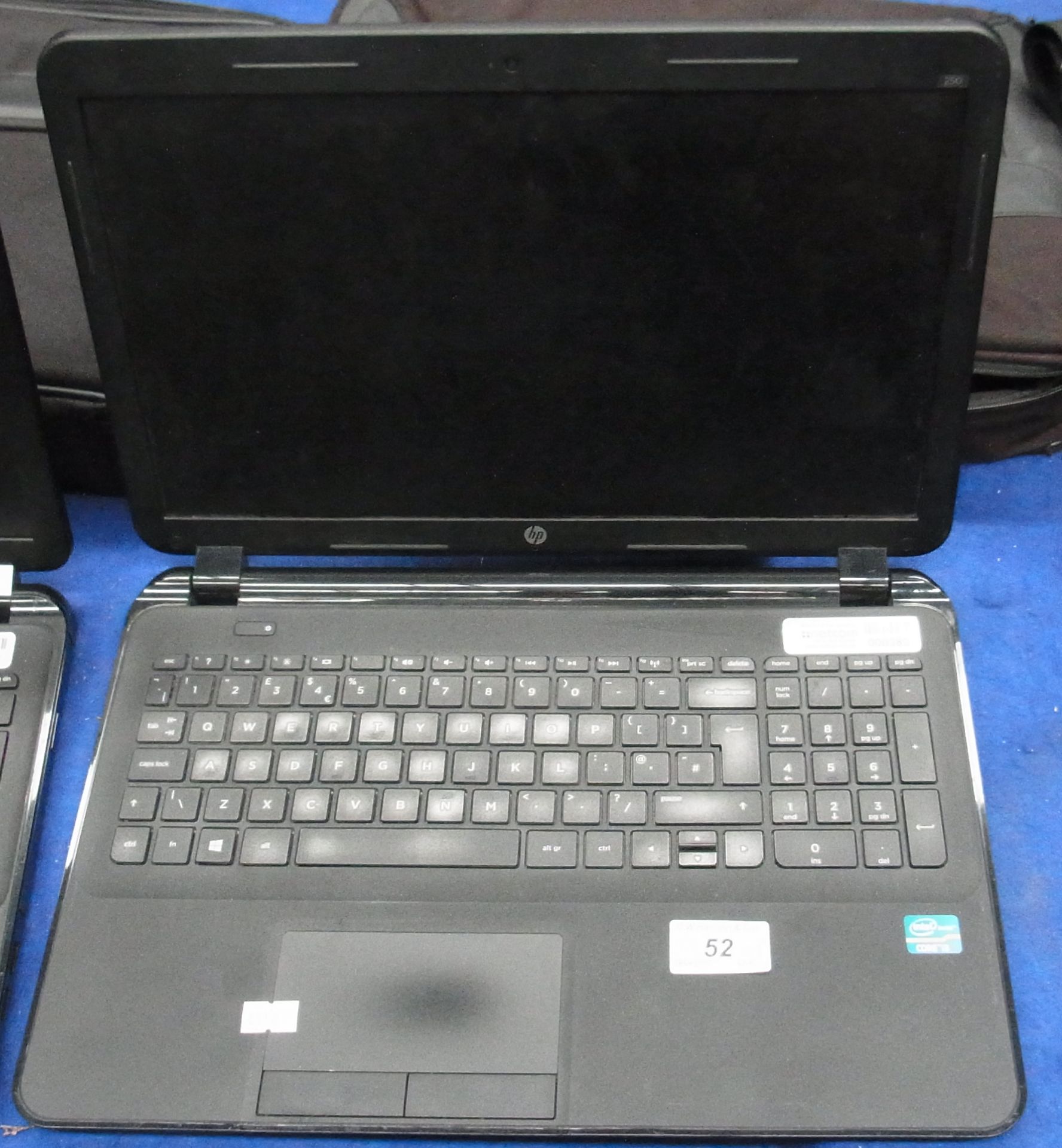 A HP 250 laptop computer complete with power adaptor and a bag