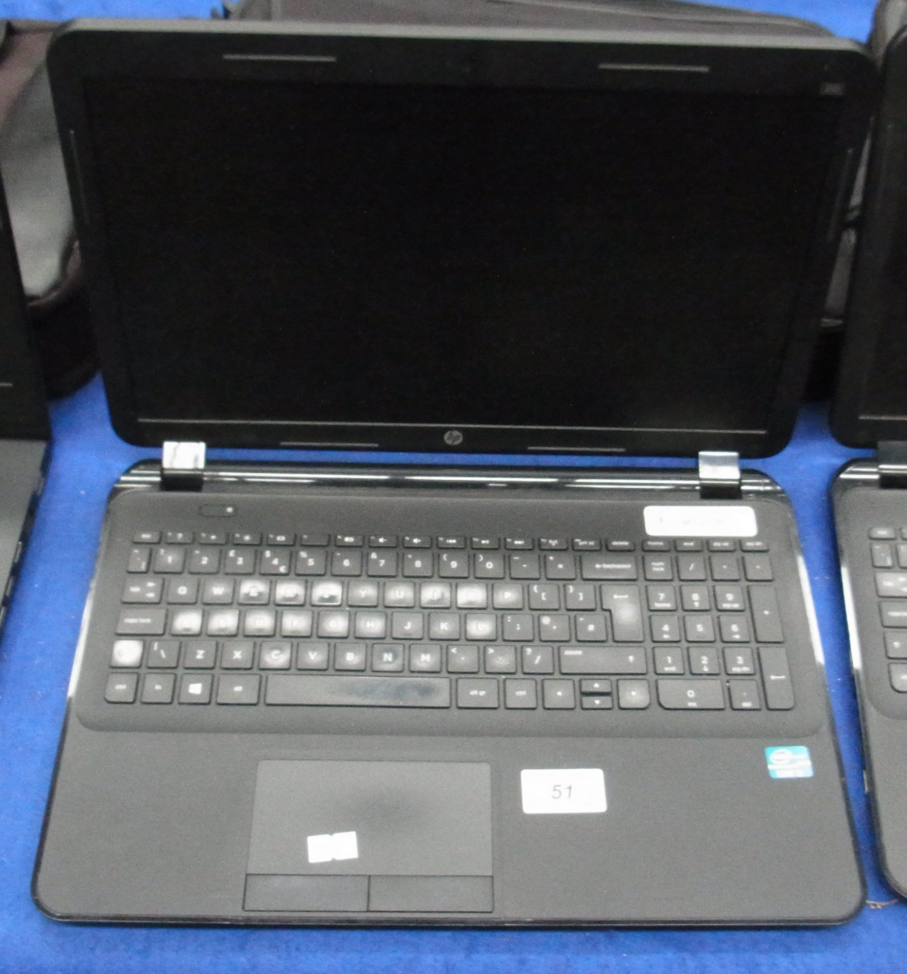 A HP 250 laptop computer complete with power adaptor and a bag