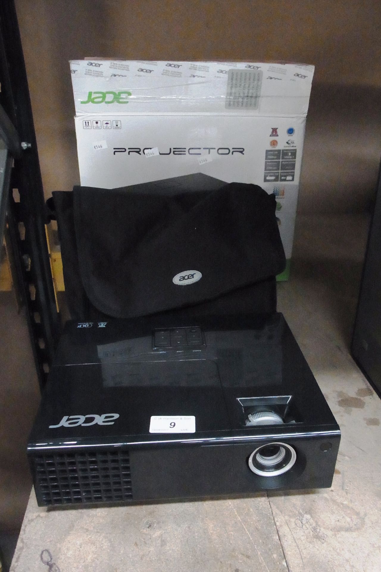 An Acer QNX1108 X1240 DLP projector complete with box, bag and manual,