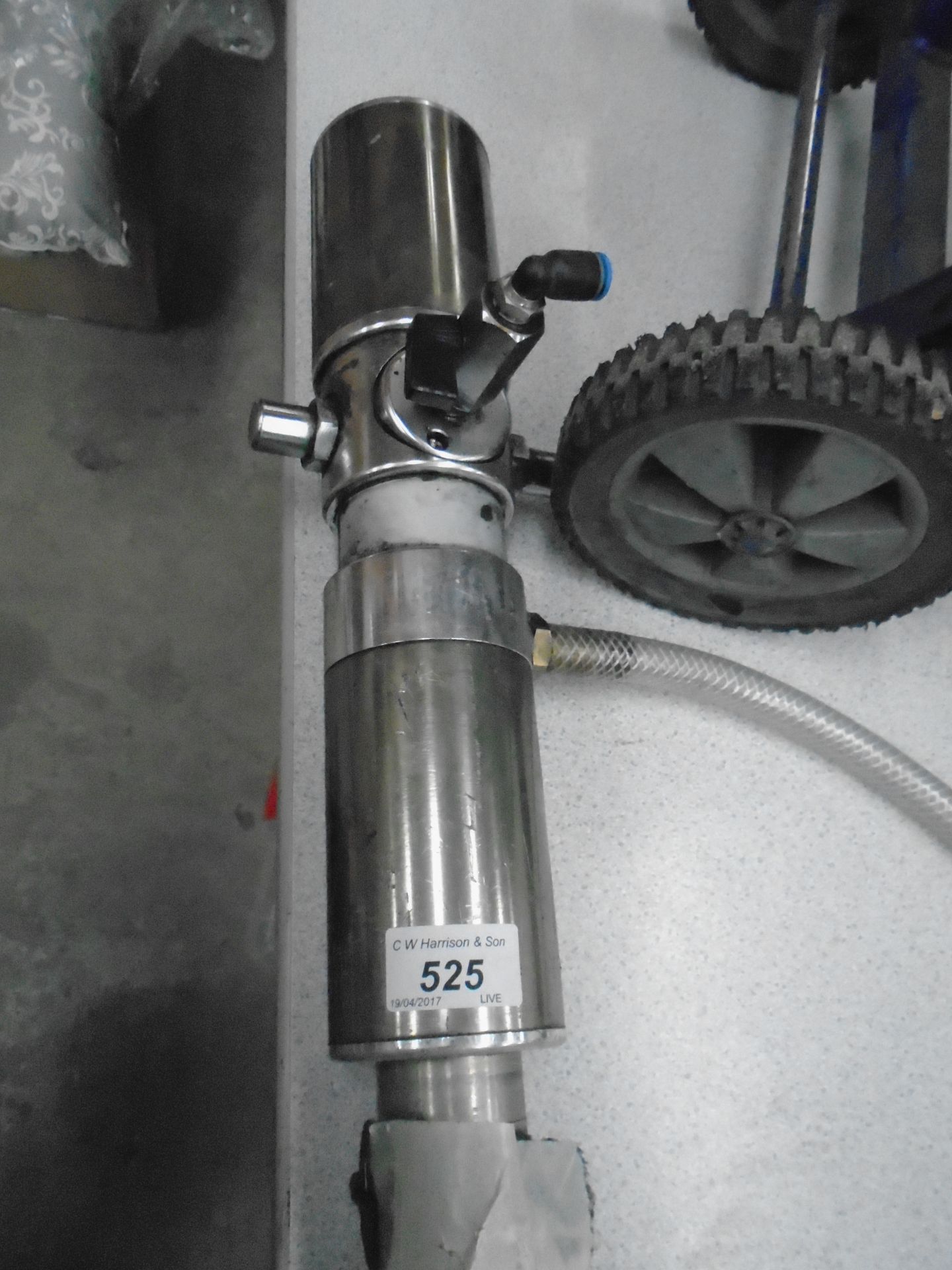 A stainless steel pump with hose