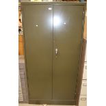 A Leabank green metal 2 door stationery cabinet 92 x 183cm high complete with shelves