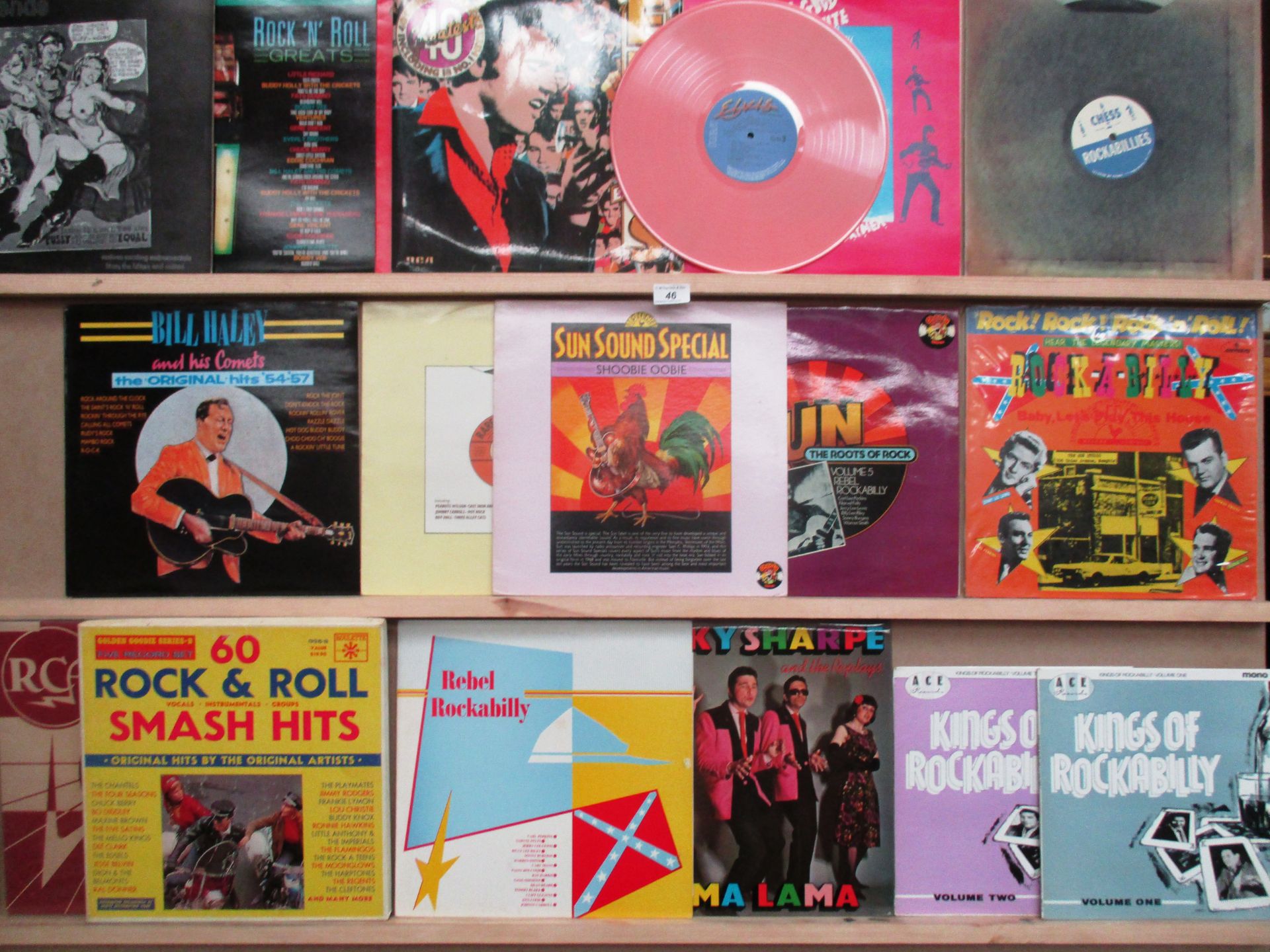 Contents to 2 vinyl coated record cases 60 assorted LP's mainly Rockabilly and Rock and Roll