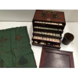 A mahogany cased 5 drawer mahjong game,