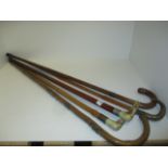 5 various walking sticks some with silver mounts