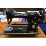 Singer treadle sewing machine adapted for electricity,