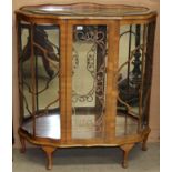 A walnut bow front china cabinet 104cm