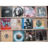 12 x assorted LPs - Bob Marley, Carly Simon, Jean Michel Jarre,