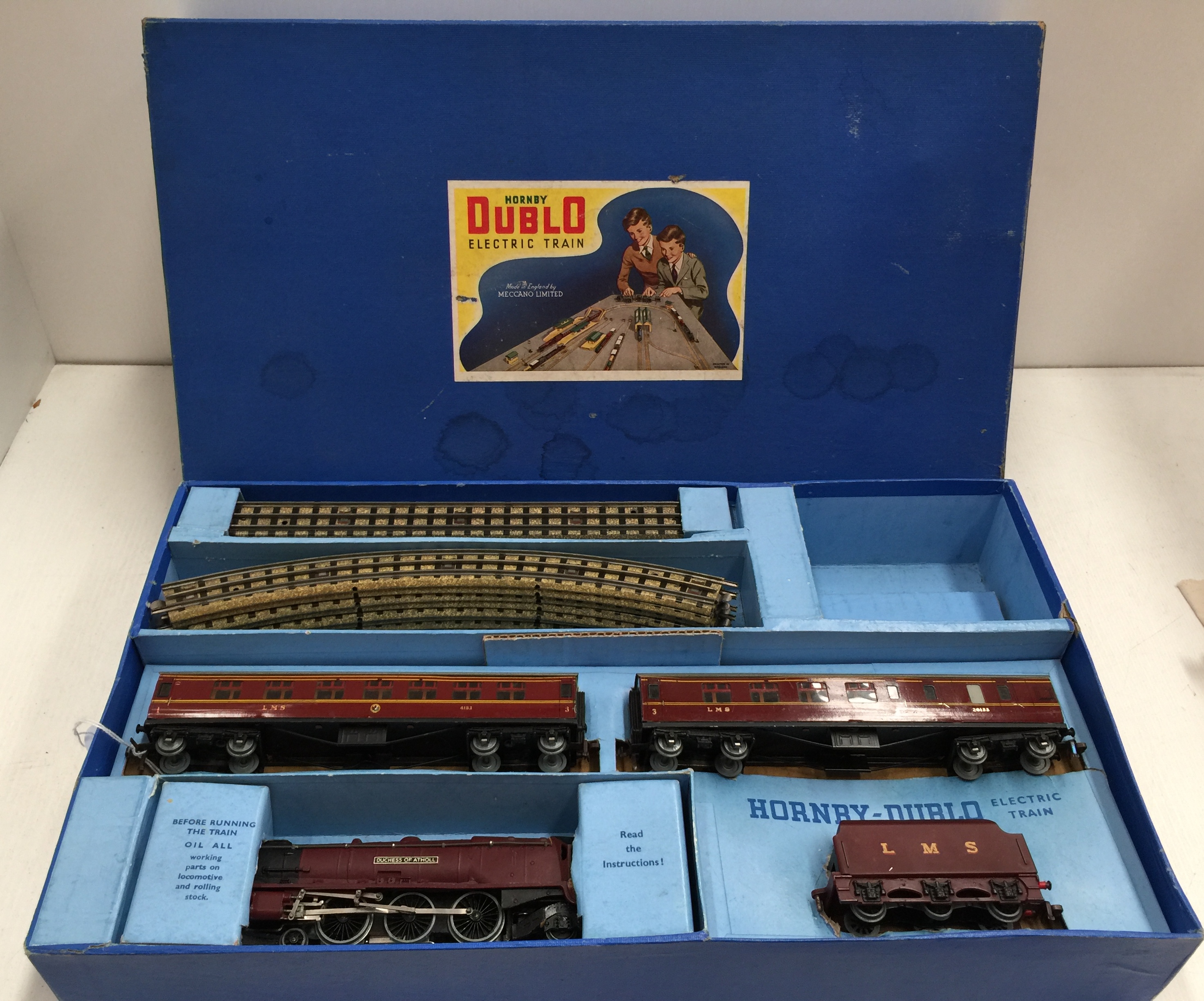 A Hornby Dublo passenger train set 'Duchess of Atholl' and LMS livery coaches in fitted box