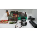 Contents to 2 small tins - a miniature pair of opera glasses, a Beier Comet Camera,