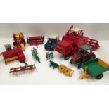 A small collection of Britain's model farm machinery including Massey Ferguson 760 combine