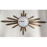 Sunburst wall clock by Metamec.