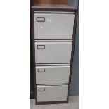 A Roneo brown and beige metal 4 drawer filing cabinet