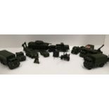 A collection of unboxed and playworn mainly Dinky Military vehicles and guns including Thorneycroft