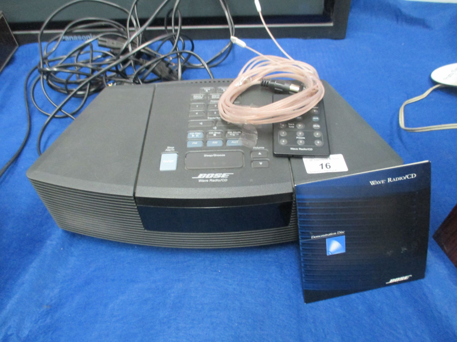 A Bose AWRC3Q Wave radio/CD player complete with remote control and demonstration disc