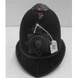 A Wakefield City Police helmet - tear to outer skin