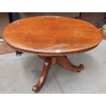 A mahogany oval loo table on centre column 4 leg base 122 x 89cm