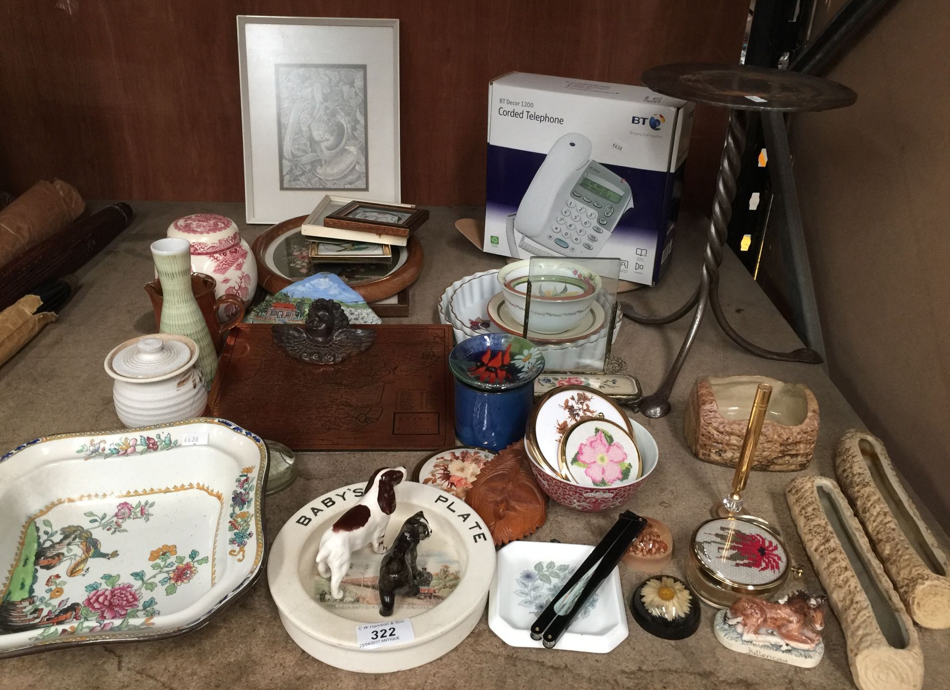 Contents to part of rack - assorted ceramic ornaments, small wool work tapestries, BT telephone etc.