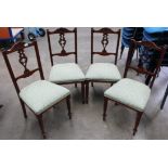 A set of 4 Edwardian mahogany parlour chairs with green upholstered seats and a mahogany framed