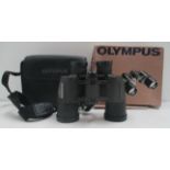 A pair of Olympus 8 x 42 EXPS binoculars in carrying case.