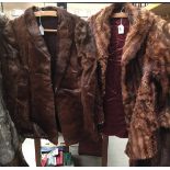 Brown fur jacket and a brown jacket [possibly pony skin].