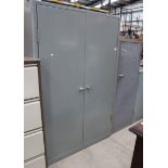 A grey metal 2 door stationery cabinet 120 x 183cm high and a grey metal single door stationery