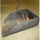 A metal half cylindrical scale pan with brass label H Pooley & Sons Ltd,