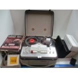 A Philips model EL3549 reel to reel tape recorder with built in remote and a quantity of reel to