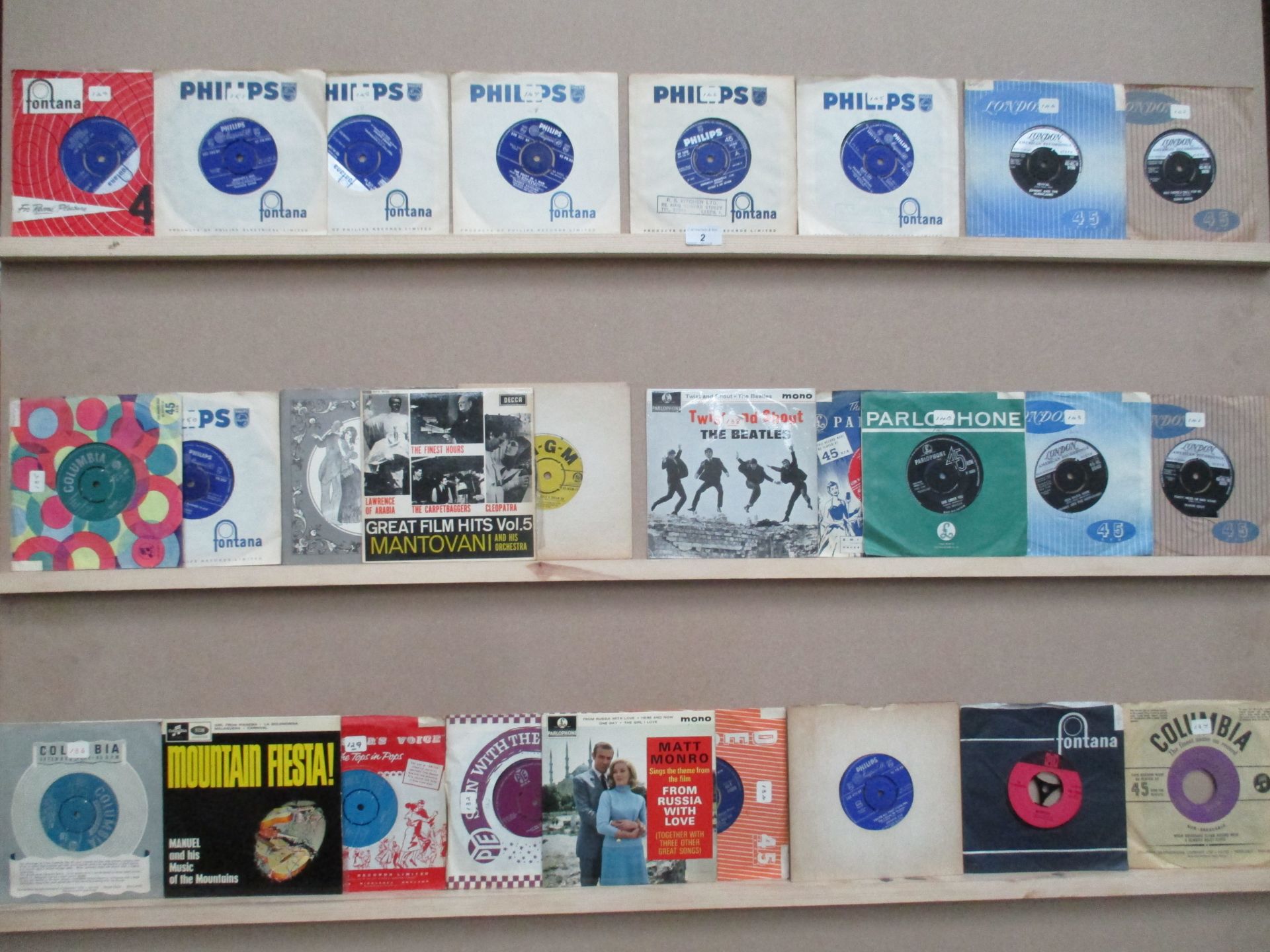 A small collection of 27 45rpm singles - mainly 1950's/60's including The Beatles 'Twist & Shout'