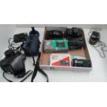 A collection of cameras, including Ricoh KR-10 Super, Pentax IQ zoom 110, Canon Demi etc, manuals,