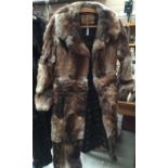 Full length brown fur coat by Maxwell Cowan [York] Ltd.