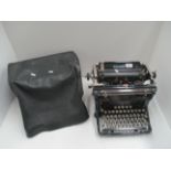 An Underwood manual typewriter complete with cover