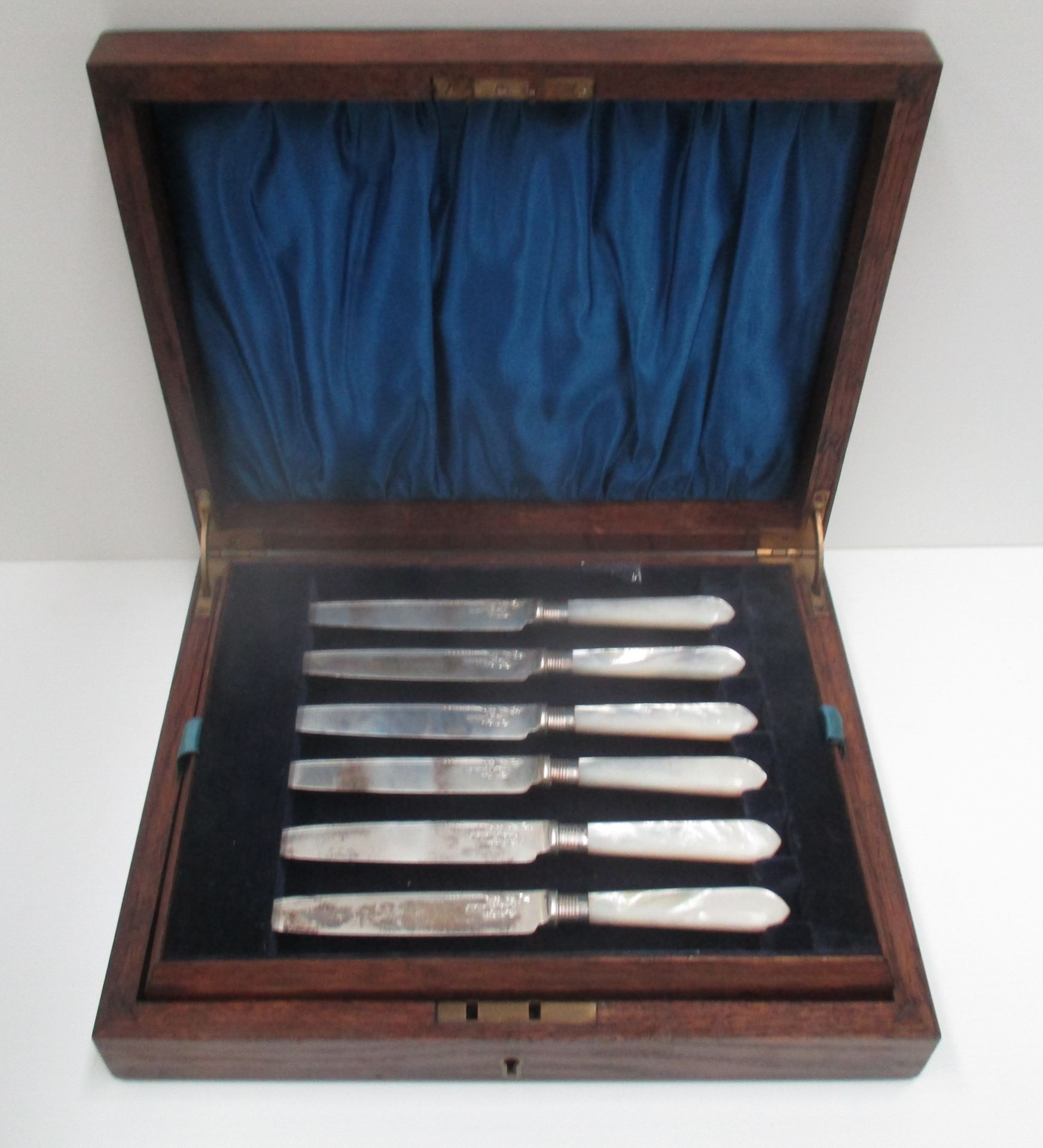 A set of six silver bladed dessert knives with mother of pearl handles and five matching forks [11]. - Image 2 of 3